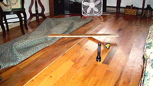 crawl space moisture causing warped cupped floors