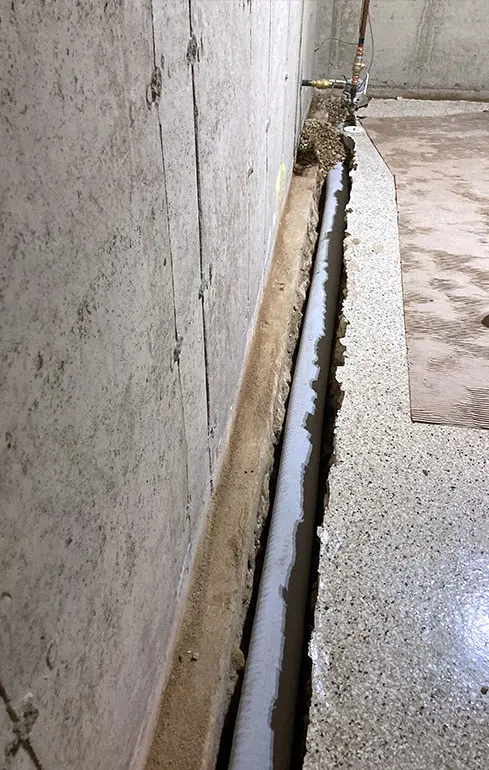 Crawl Space Brothers | Basement Interior Drain Tile System
