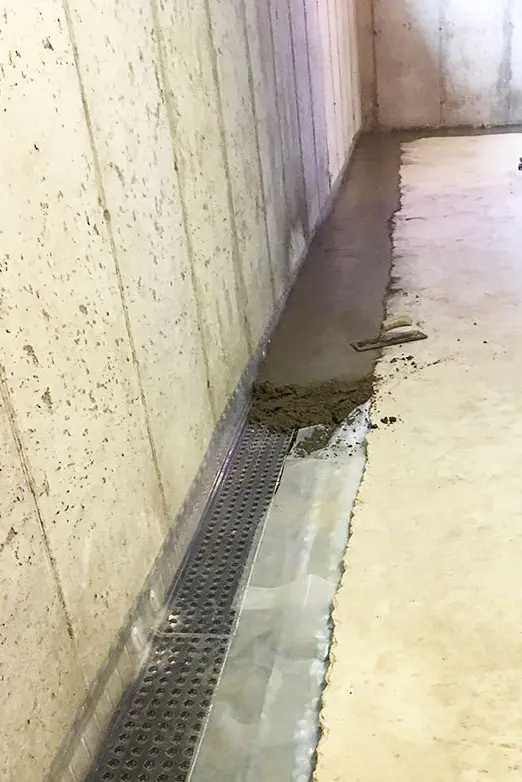 Crawl Space Brothers | Basement Interior Drain Tile System