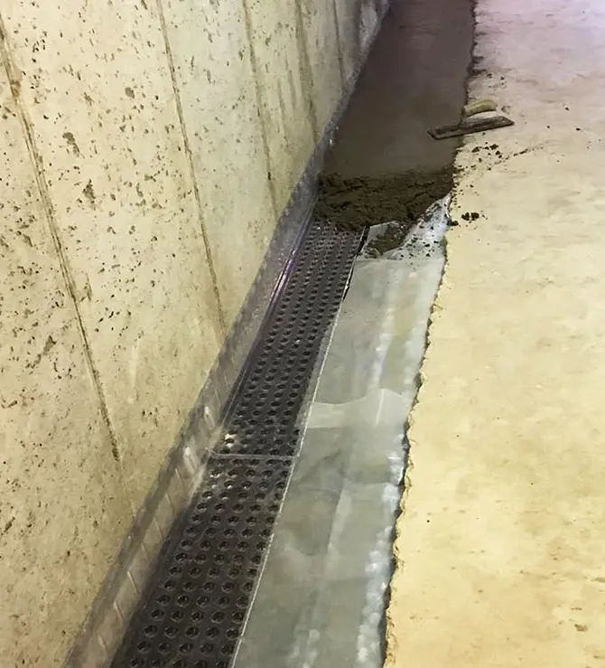 Crawl Space Brothers | Greenville SC | Basement Interior Drain Tile System